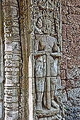 Preah Khan temple - bas-reliefs of threshold guardians.